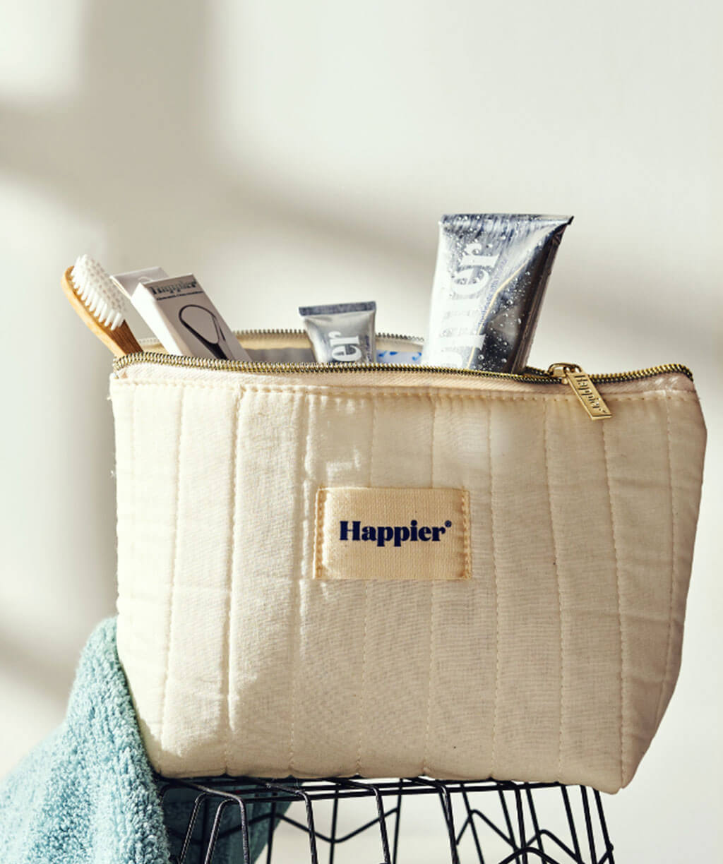 A vibrant washbag filled with other oral essential products, perfect for a joyful and refreshing travel experience.