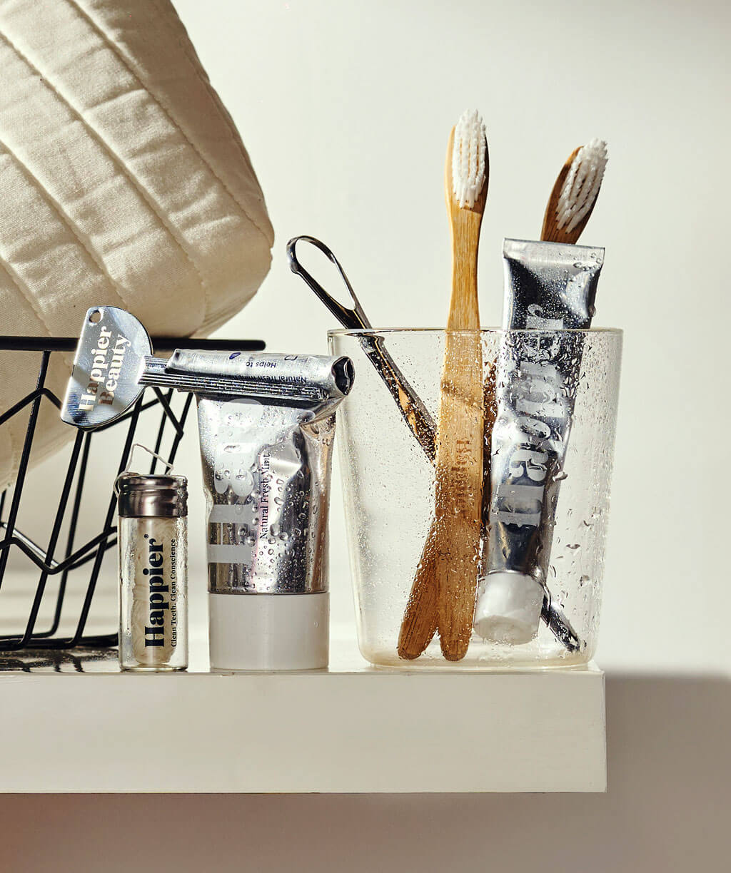 Happier dental hygiene essentials displayed on a shelf - Welcome offer kit